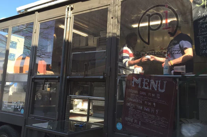 The Pi Indy food truck's signature plexiglass wall